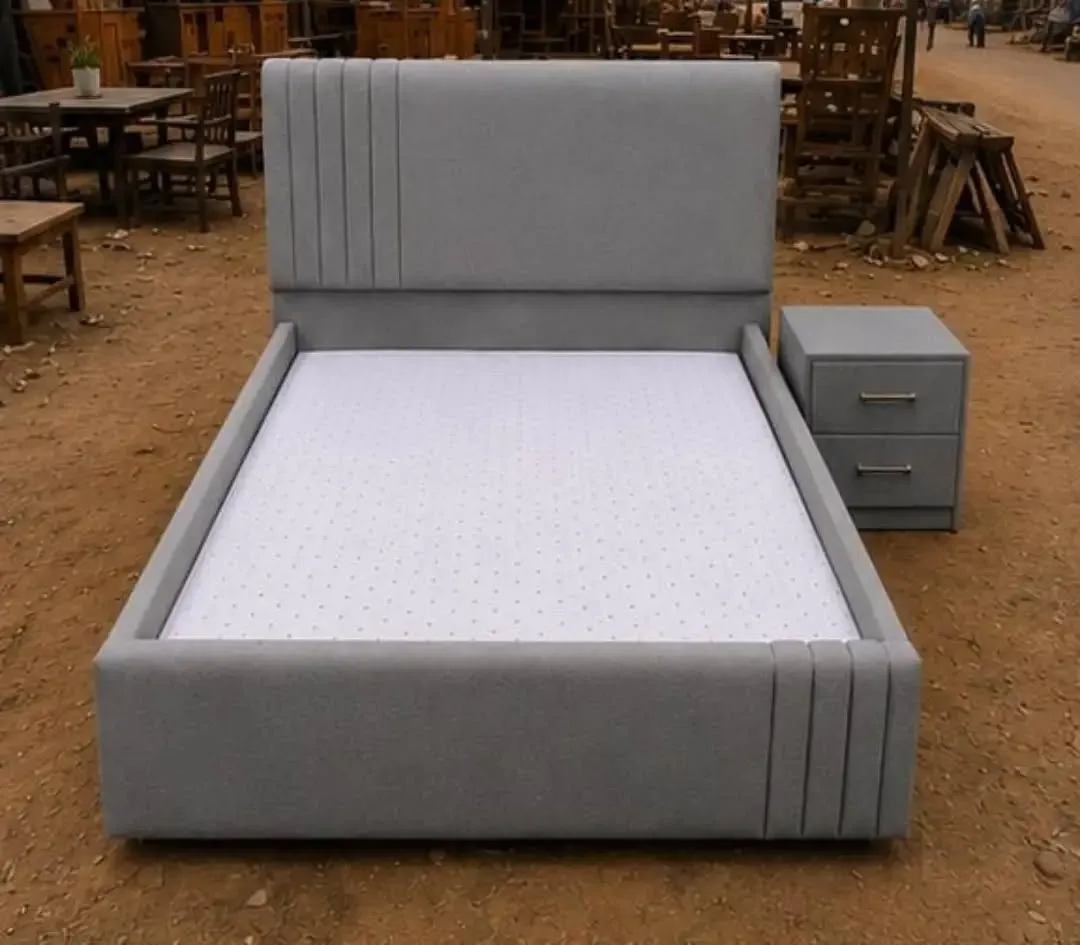 Brand new 4.5x6ft upholstered bed frame with side drawer